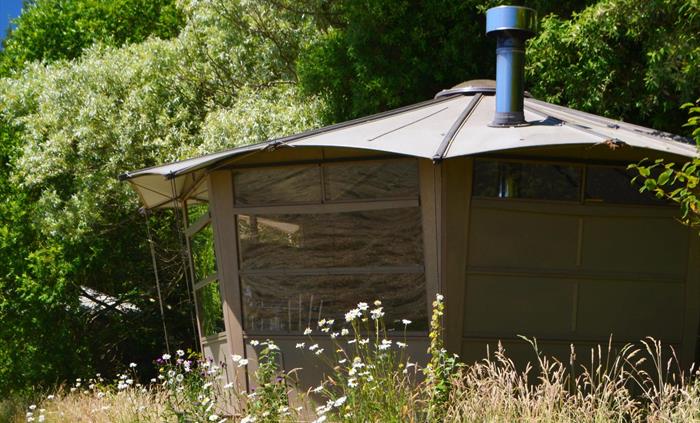 The Cabans. Hide’s three cosy wooden Cabans are individually hand made, tucked between trees, bushes and wildflowers. Each has plenty of space, with i